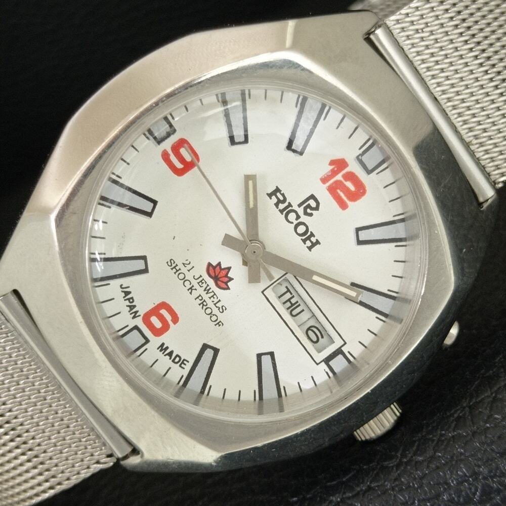 Vintage 1976 Ricoh Automatic Mens Silver Watch W/daydate & Red accents
